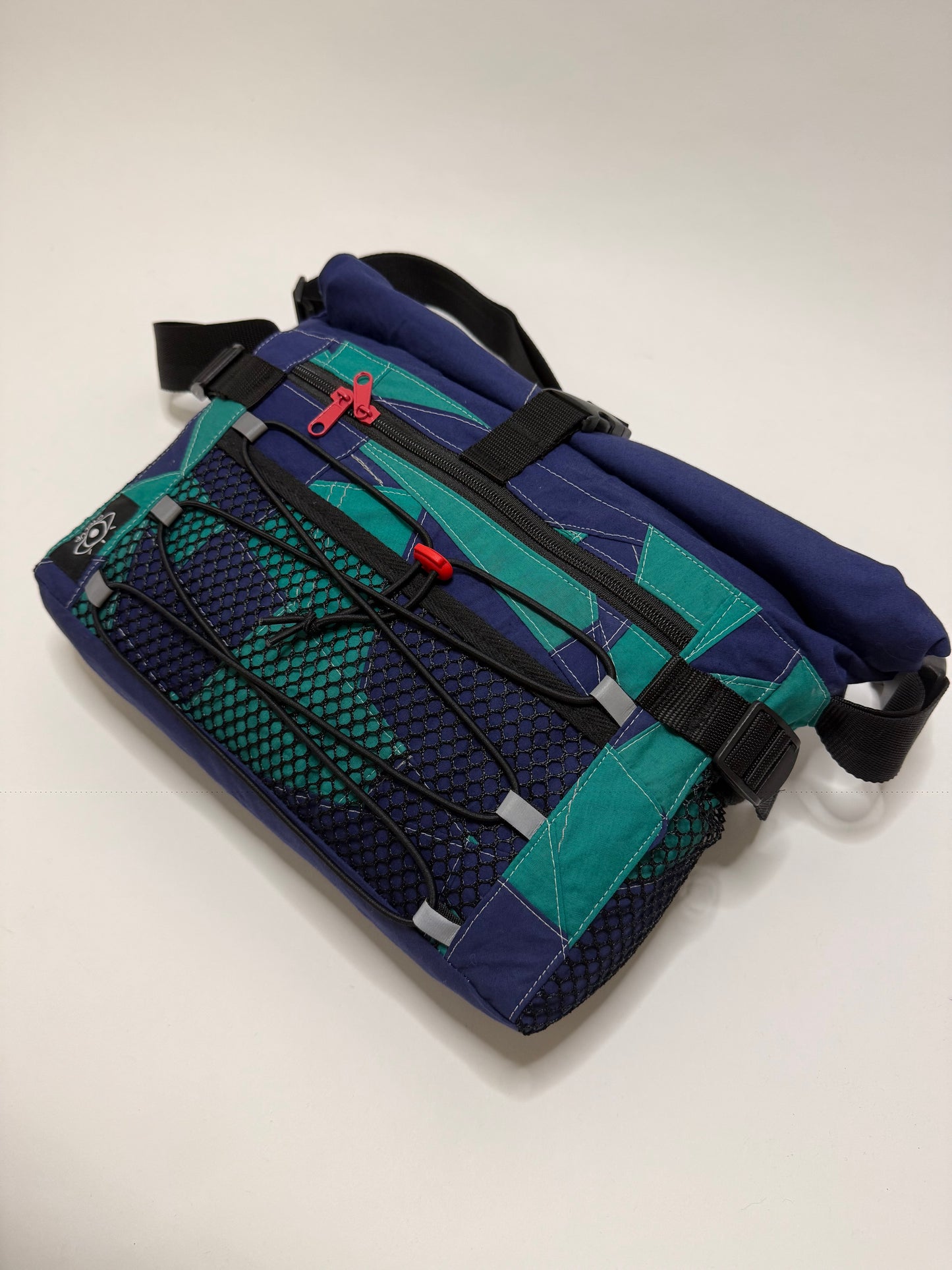 Sac besace roll top