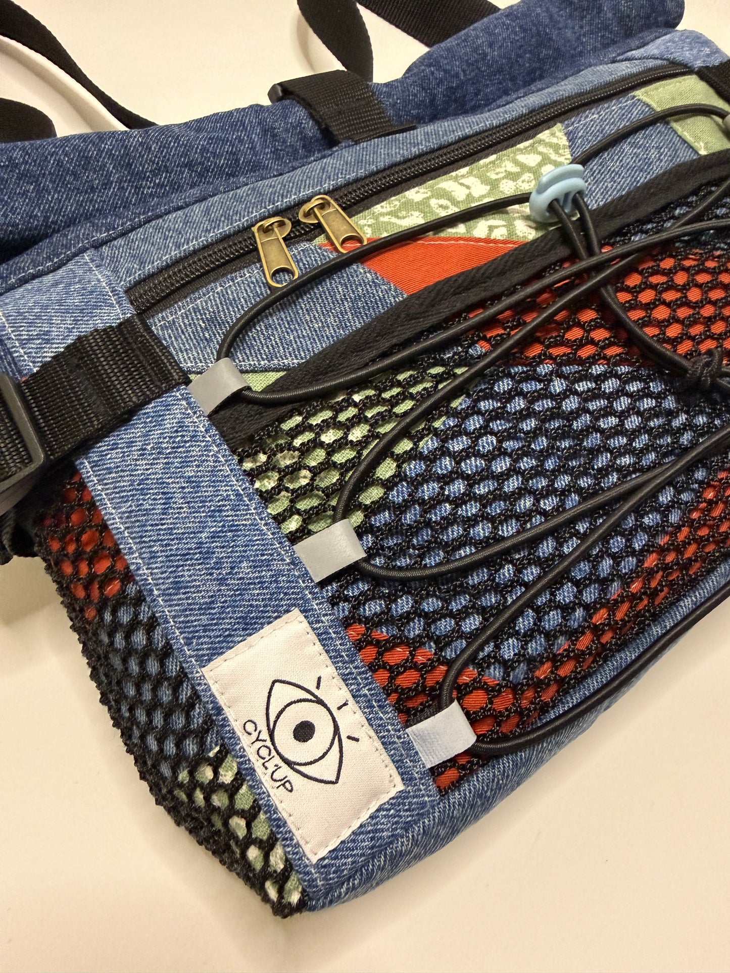 Sac besace roll top